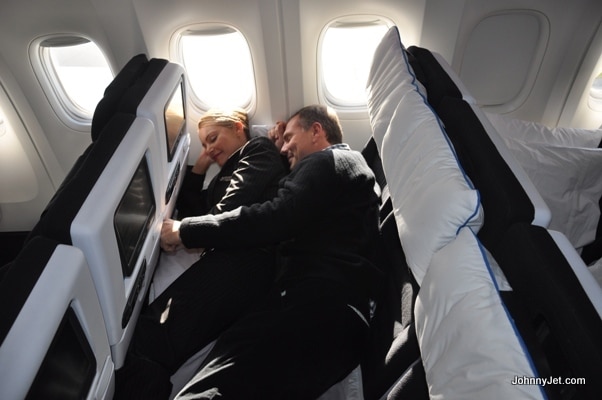 Here’s the biggest reason their 777-300 plane has received so much hype, and deservedly so. Air New Zealand is the first real airline to invest millions of dollars in an innovative coach product. There are 244 seats in economy, and 60 of them can be turned into Skycouches (with 20 different combinations). That’s right: The leg rests of three seats together flip up to form a flat area (5’1″ long). The configuration would make the trip much more pleasurable for a couple or family traveling together—at a fraction of the cost of business class. Note: The Skycouch only fits two adults comfortably, so couples need to pay for the third seat.
