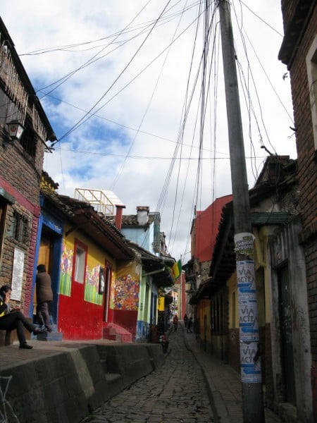 Explore the artsy neighborhood known as La Candeleria, including a walk through the narrow street called Calle del Embudo.