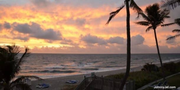 Bring your cash back credit card on vacation and see sights like this beautiful sunrise at the Holiday Inn Highland Beach in Florida. Credit: Johnny Jet
