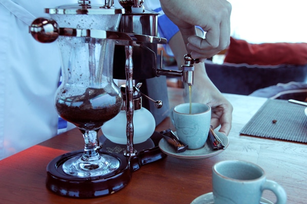 Black Ivory coffee being poured