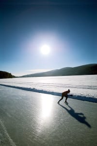 A skater enjoys the winter sun at Lake Morey Resort