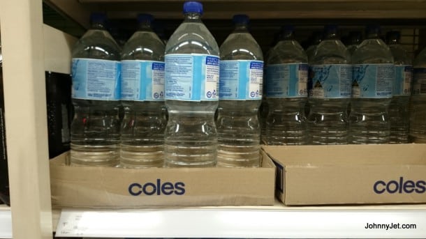 Buying water at Coles for $1.09