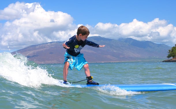 Six-year-old Ryan surfing, as per his wish, the waves of Hawaii