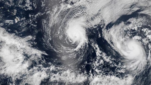 Hurricane Iselle and Hurricane Julio (R) are pictured en route to Hawaii in this August 5, 2014 NASA handout satellite image. Hurricane Iselle is expected to make landfall on Hawaii August 7, 2014.(Reuters / NASA)