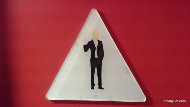 Mens bathroom sign at Virgin America's LAX Loft 