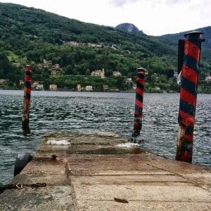 Sitting on the dock of the lake listening to the waves lap