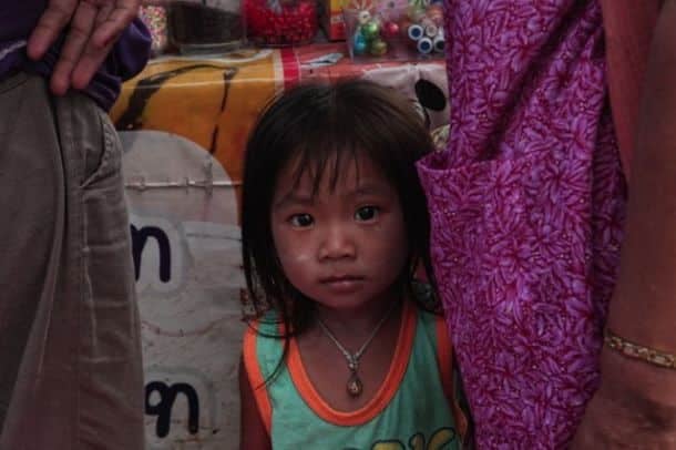A shy kid at market 