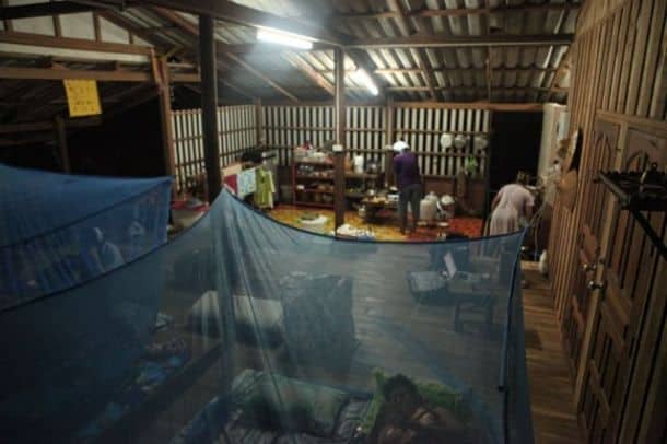 Sleeping in mosquito nets