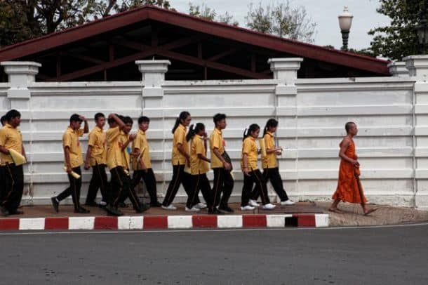 Students walking toward the palace