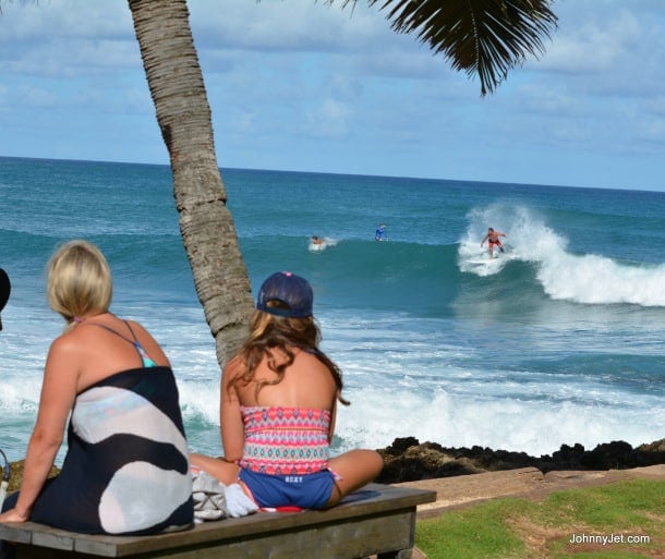Turtle Bay Resort guests watching surfers on The Point