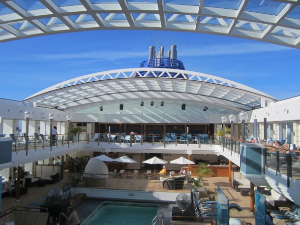 Pool deck with retractable roof