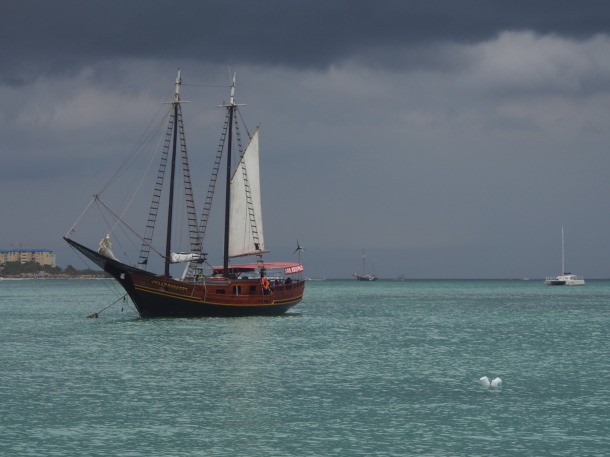Jolly Pirates boat, beneath unusually stormy skies
