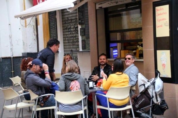 Friends enjoying drinks in Seville
