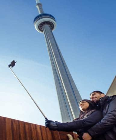 Hotel guests are using the provided selfie stick on the patio of the Spa InterContinental Toronto near the CN Tower above (Credit: Nicholas Lachman)
