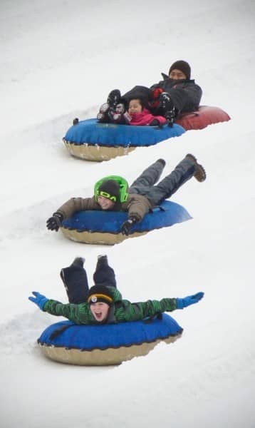 Tubers make their way down Camelback Snowtubing Park