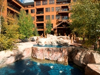 Condos at The Springs are a kid favorite with its swimming pool waterslide