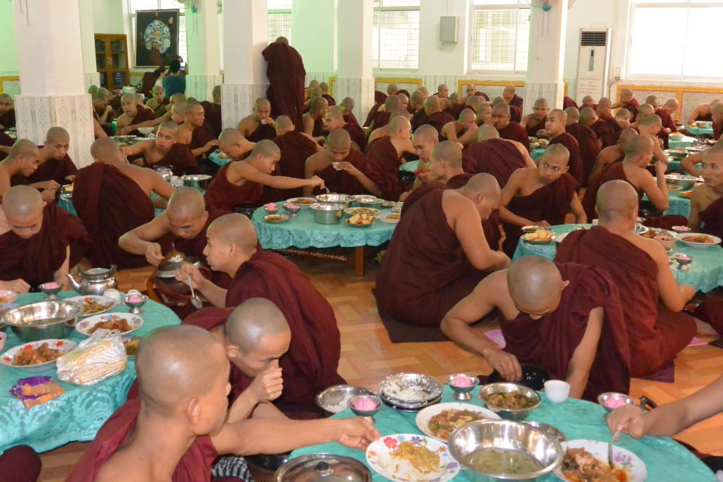 Monks having their last meal of the day at Kyakhatwaing Monastery