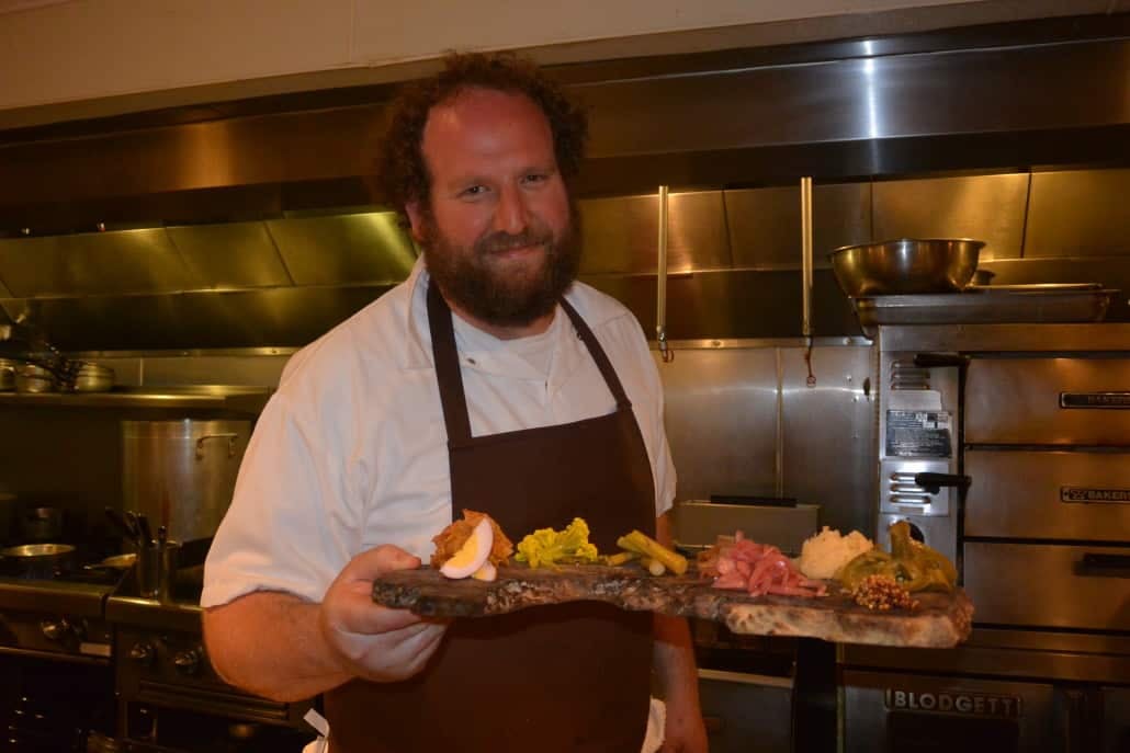 Chef Dan, owner of Backyard, with his signature Pickle Board