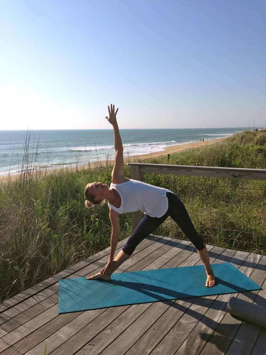 Yoga on the beach at Sanderling