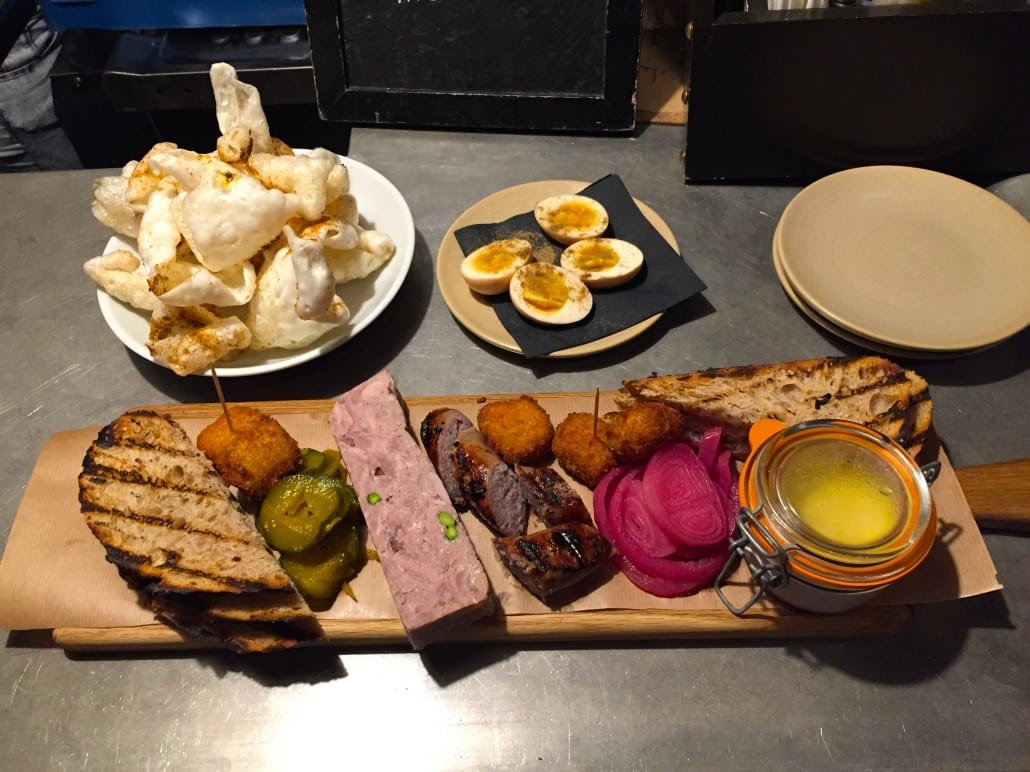 Meat Plank at The Bridge Tavern: "Pressed duck & pistachio terrine, grilled sausage, pig's head croquette, potted ham, sourdough toast & pickles"