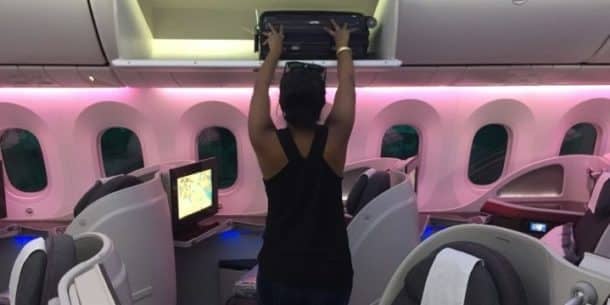 Natalie using the overhead bins back in 2015.