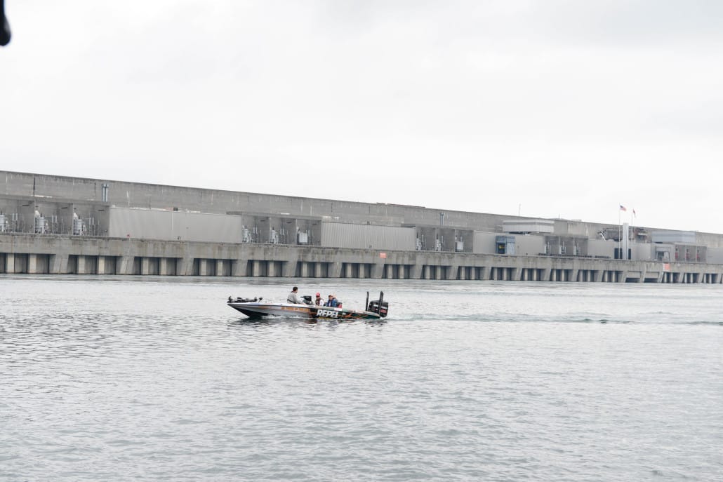 Beneath the shadow of the Robert Moses Dam are participants in the annual Governor's Bassmaster Challenge