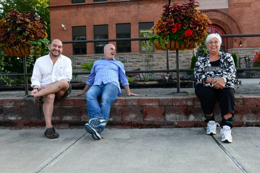 Owner John Wade (middle) and partner Carlos (left) lughing in front of the Sherman Inn