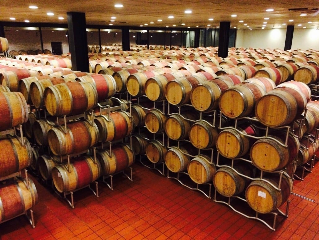 Wine barrels being aged at Poliziano