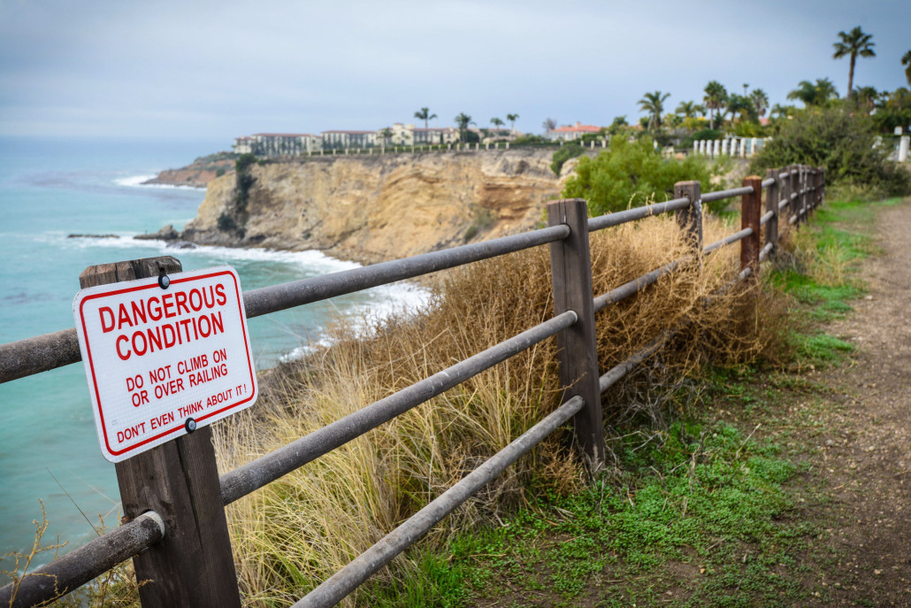 In case you were thinking of getting a closer look, signs remind of the dangers along the cliffside paths at Terranea