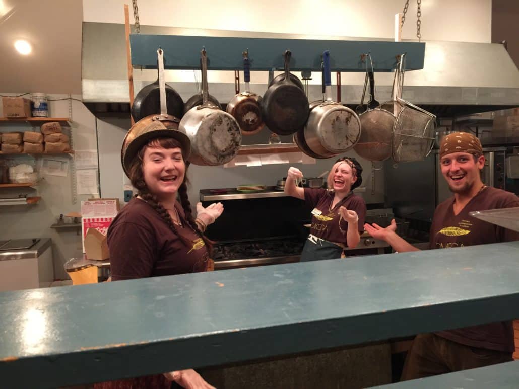 Happy cook staff at Café Omega