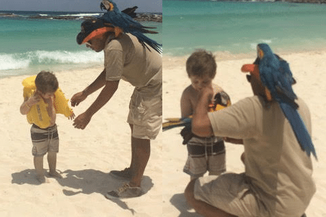 3-year-old Theiss with parrot on the beach at Club Med Cancún Yucatán