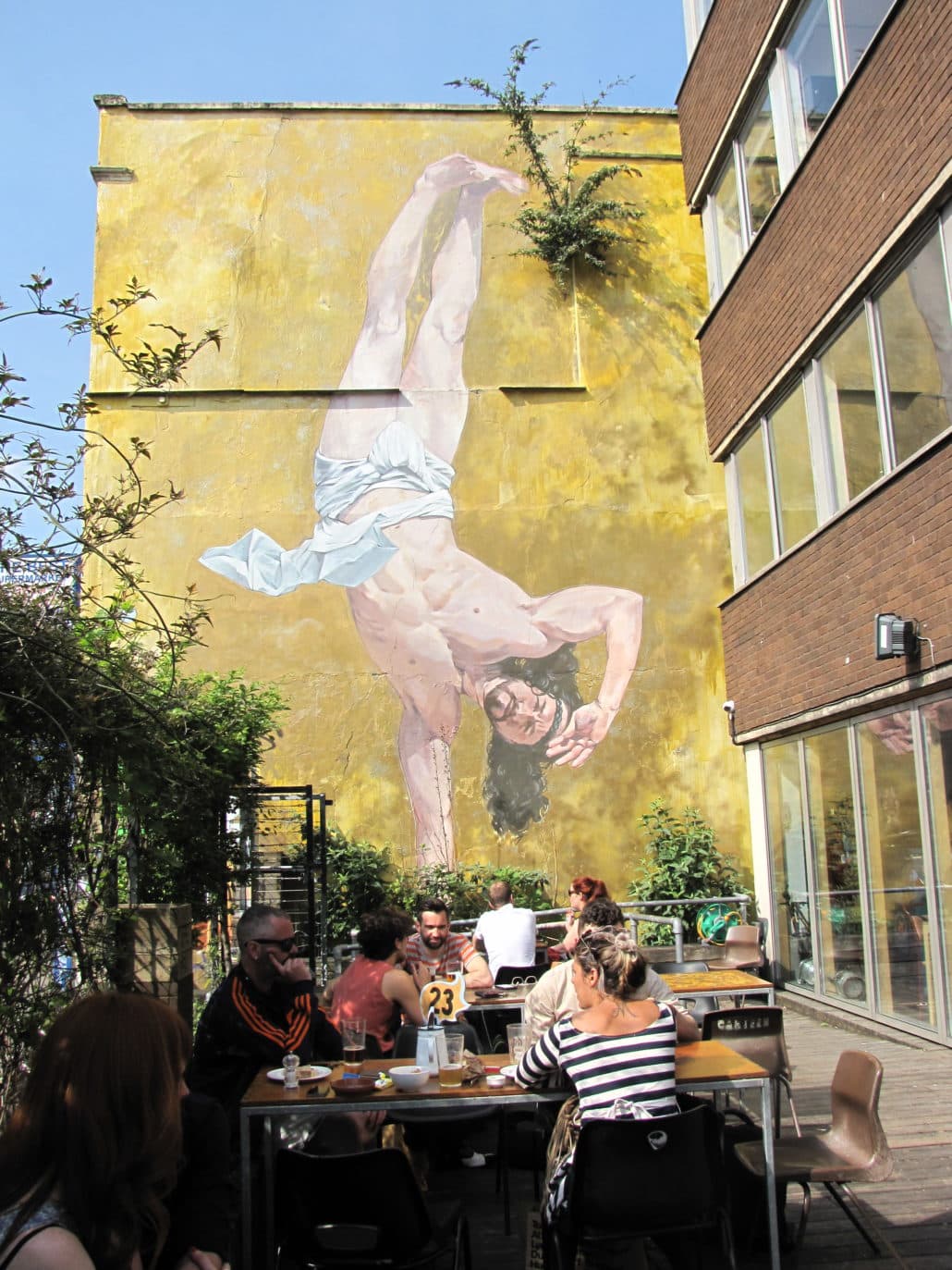 A giant mural dubbed "Breakdancing Jesus" adorns a building in downtown Bristol