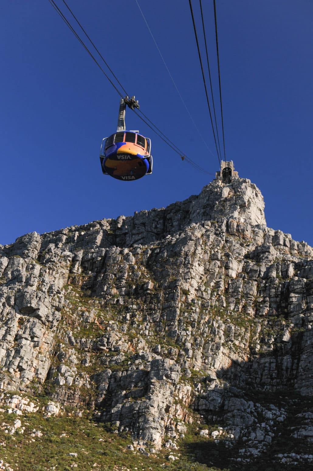 One can reach the top of Table Mountain at 3,500 feet in less than five minutes in the new rotating cable cars
