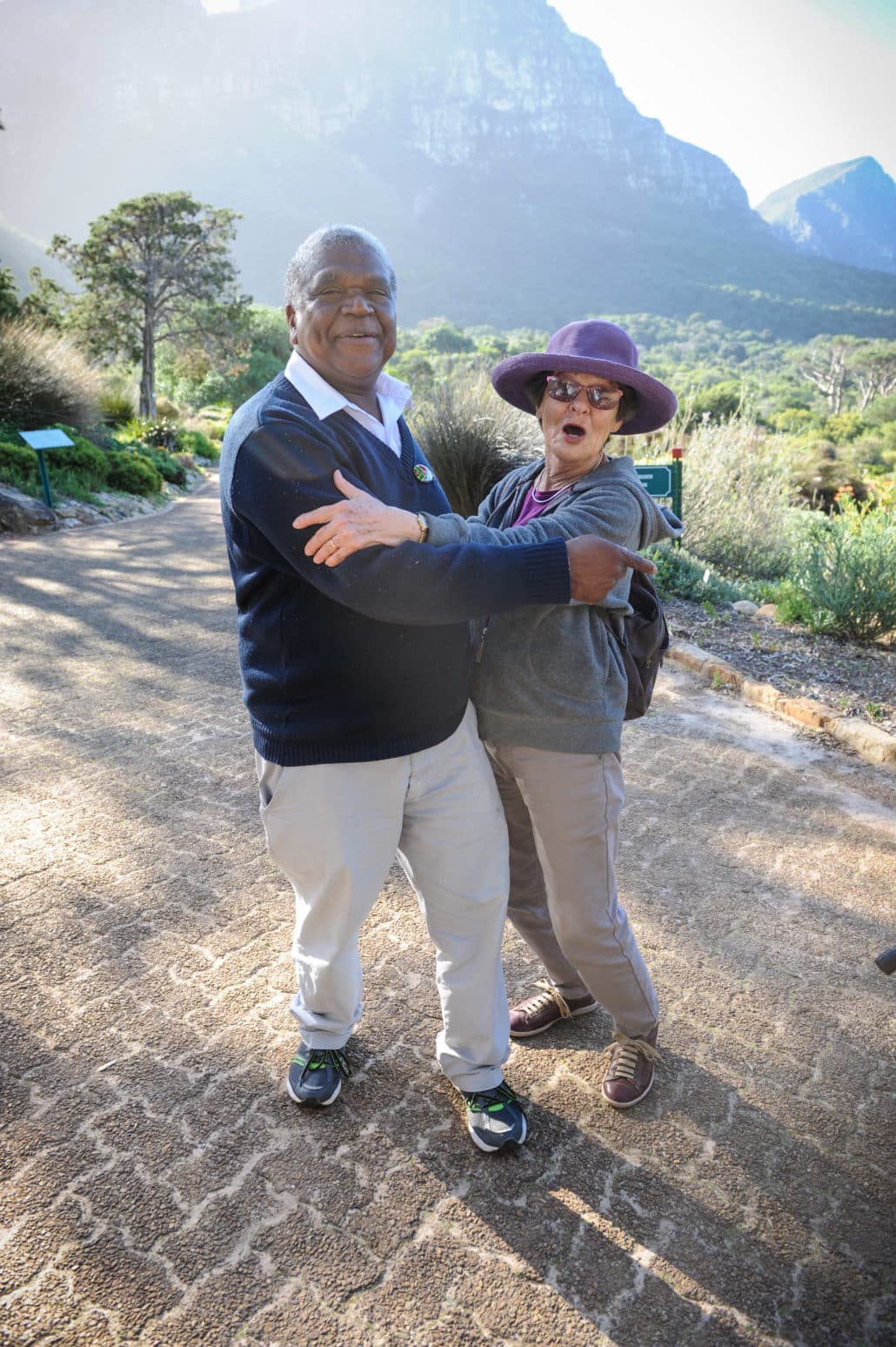 Andrew Phillip Jacobs, our guide for this day and 40-year employee at Kirstenbosch National Botanical Garden, engages with a volunteer who frequents the park