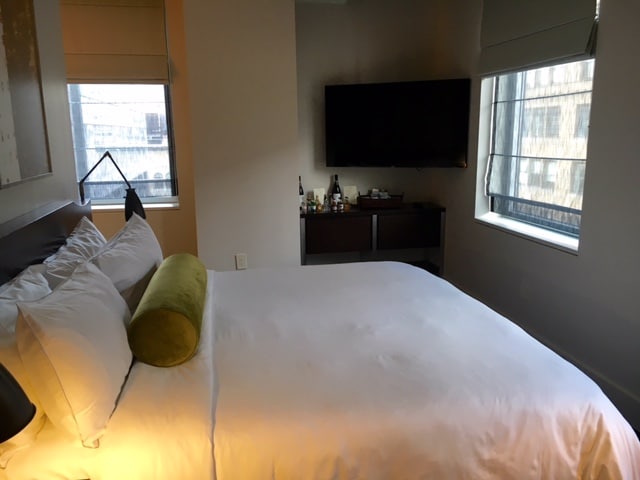 Comfy king-size bed in my studio suite at The Marmara Park Avenue