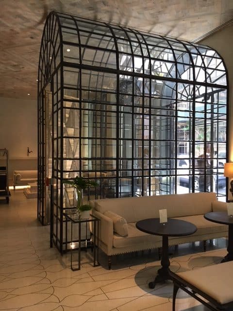 The dramatic vestibule entryway into the hotel lobby is made with 670 pieces of faceted steel