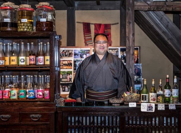 Kazuteru Miyamoto behind the bar at his establishment