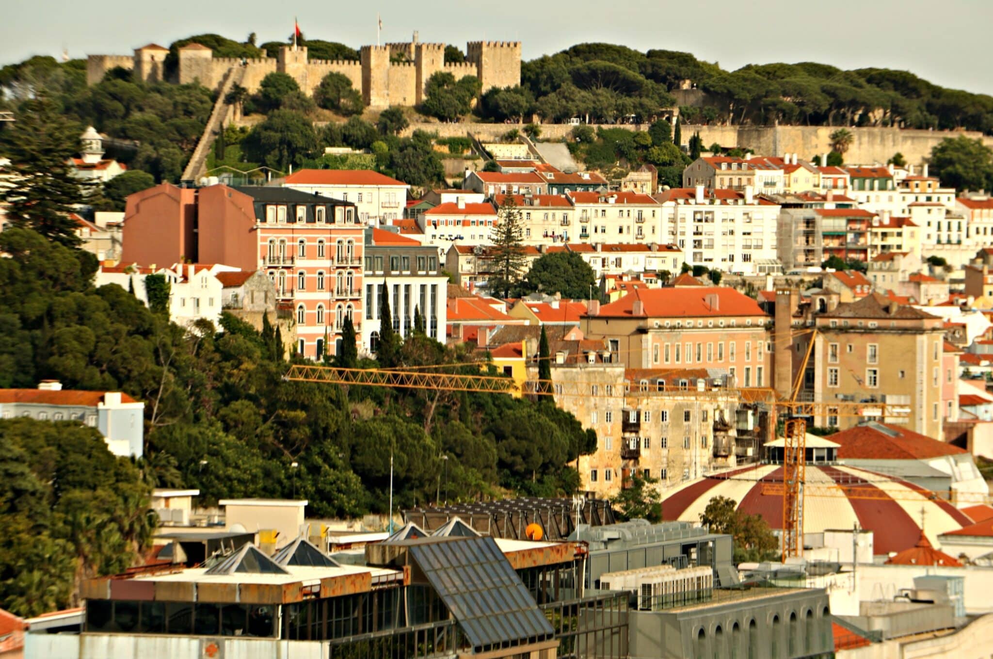 View from Miradouro da Graça, one of the city’s highest lookout points with Sao Jorge Castle (a Moorish fort) in the background