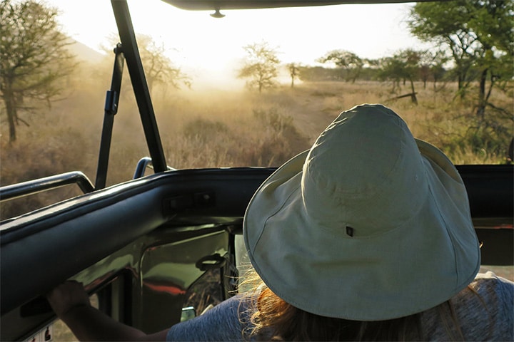A wide-brimmed safari hat is a must-have to keep the sun out of your eyes and off your neck and face