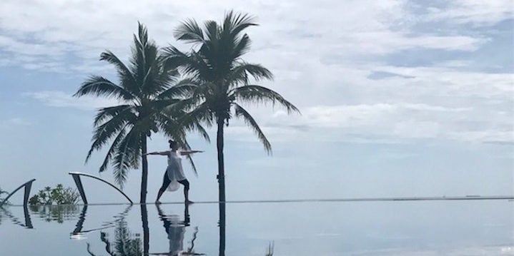 Yoga at the infinity pool