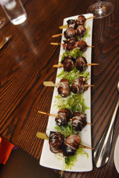 Bacon-wrapped dates stuffed with Marcona almonds