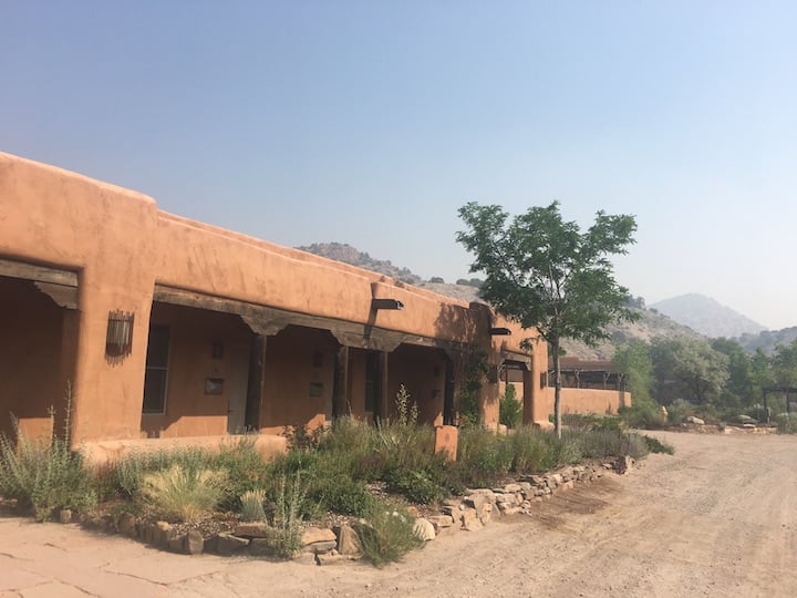 The Plaza Suites at Ojo Caliente under the smoky sky due to a nearby forest fire