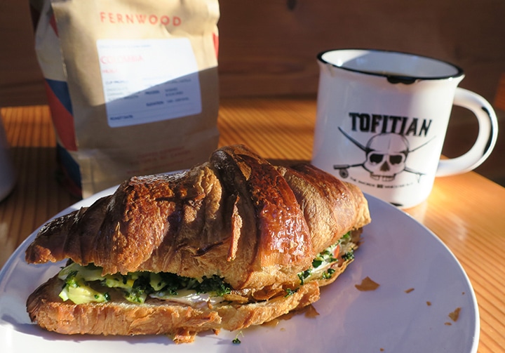 Fresh pour-over and breakfast sandwich at Tofitian Cafe, Tofino