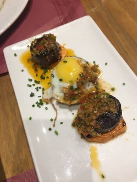 The blood sausage and quail’s egg at Meson de Cervantes