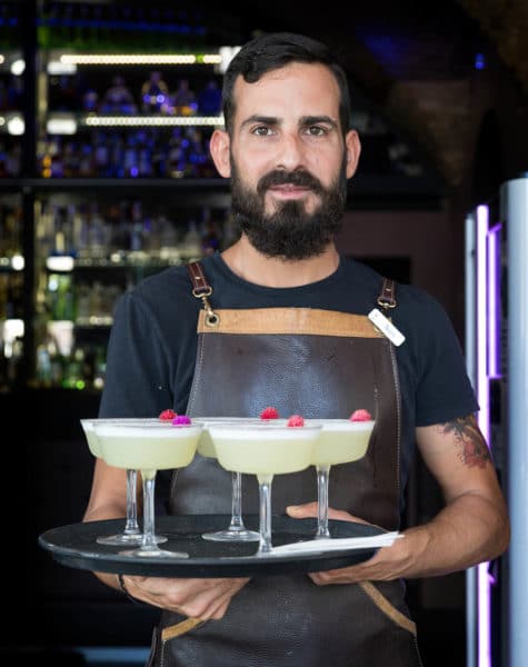 Nuno Leitão serves the amarguinha sour at Colombus Bar in Faro 