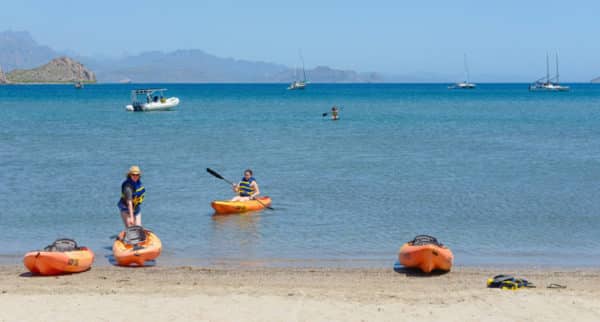 Calm blue waters are perfect for kayaking and paddleboarding