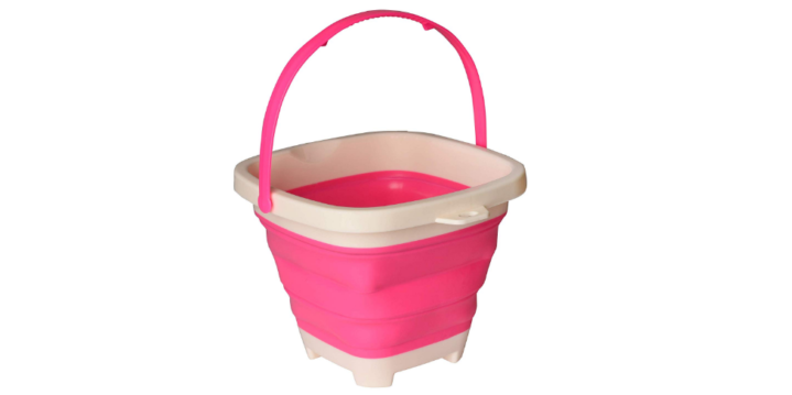 This collapsible beach bucket is easy to travel with