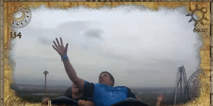 Man catches stranger's phone on a roller coaster
