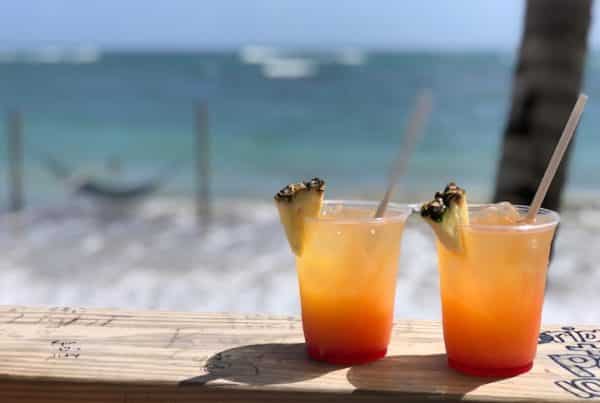 Rum drinks of some style beside the Caribbean Sea at Paradise Beach bar
