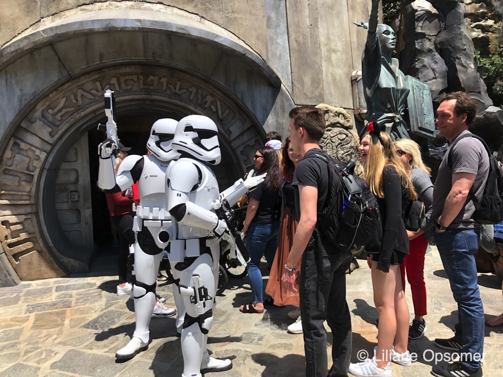 Stormtroopers check guests throughout the land